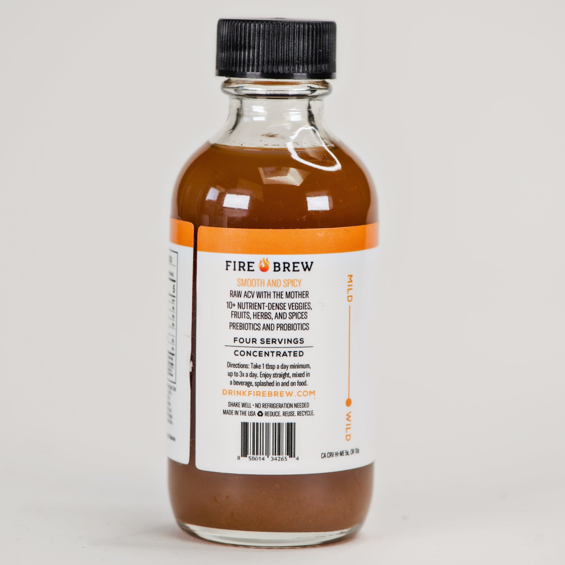 Back label of Fire Brew apple cider vinegar tonic bottle highlighting ingredients and usage.