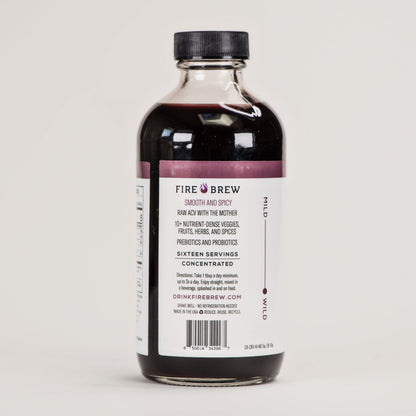 Back label of Fire Brew apple cider vinegar tonic shows ingredients, serving details, spice level, and usage directions.