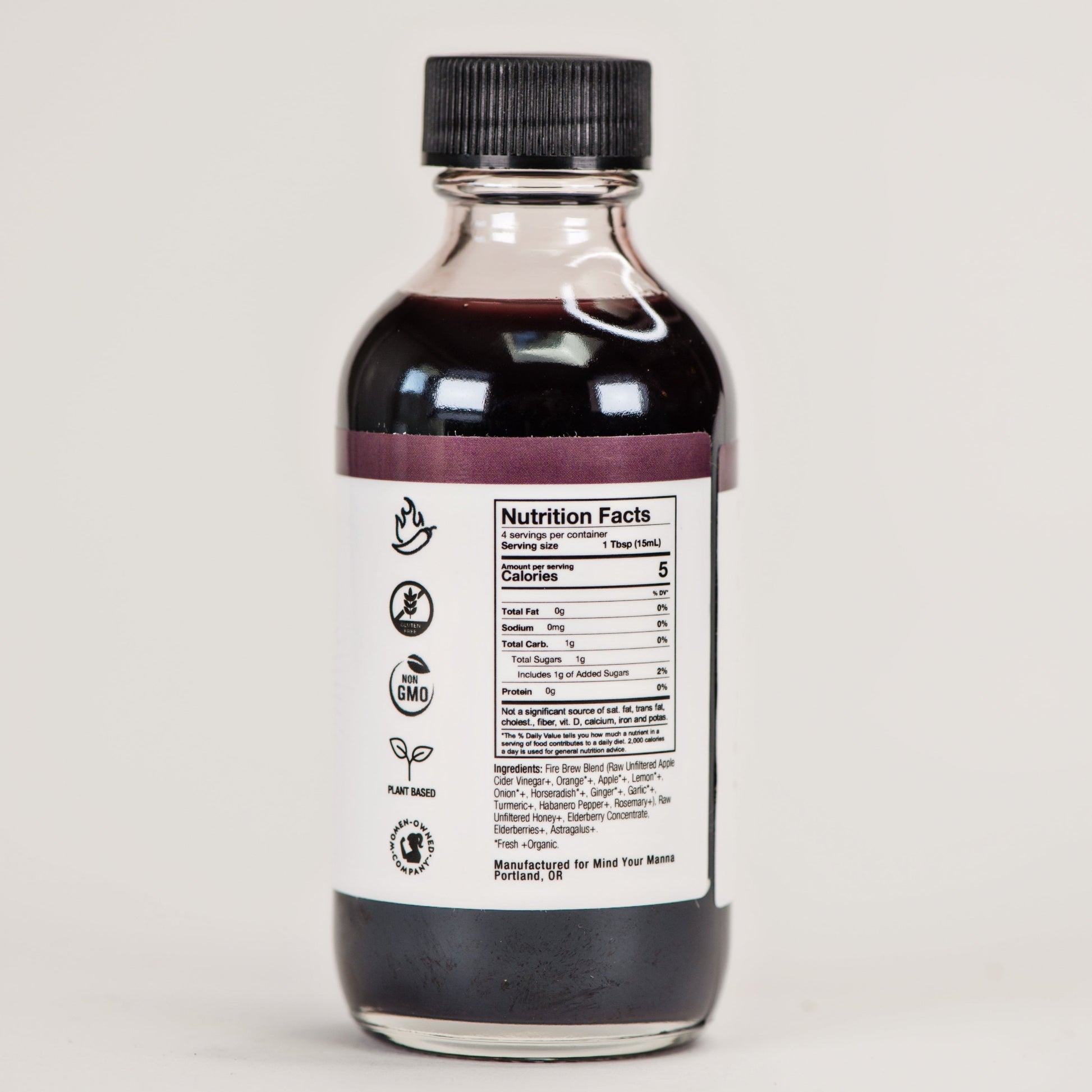 Back view of beet Fire Brew apple cider vinegar tonic showing nutrition facts and all-natural ingredients.